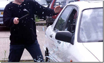 Man breaking into a car robbery theft theif modus operandi robbery wheninmanila thumb