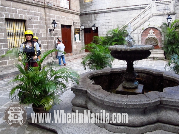 white-knight-intramuros-tours-electric-chariot-when-in-manila-plaza-san-luis-complex-fountain