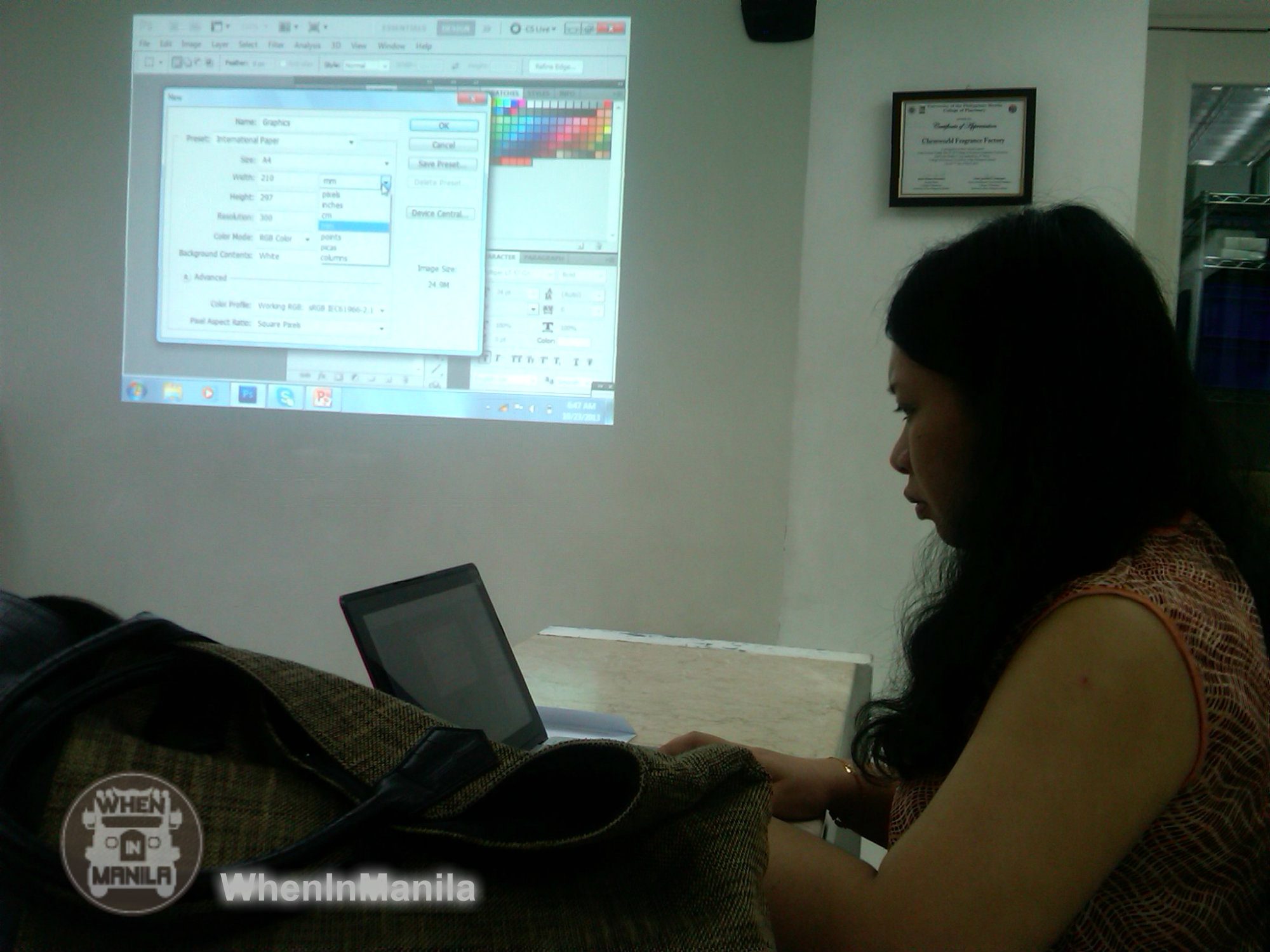 A student for a day of TradeSchool Manila, Joanne, following the teacher's step by step process on her own laptop.
