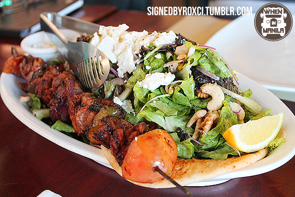 Mixed greens spruced up with raisins and nuts, paired with a skewer of char-grilled Chicken Souvlaki.
