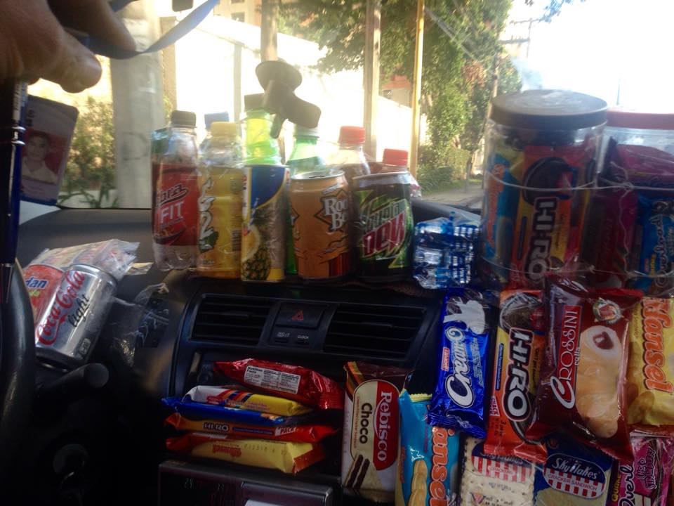 This Taxi Driver Has a Snack Store You Can Buy From During Rides