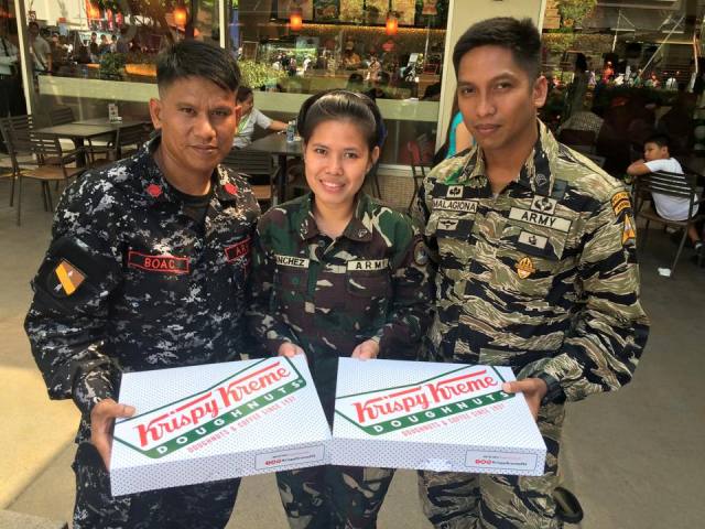 Guy Treats Soldiers with Donuts