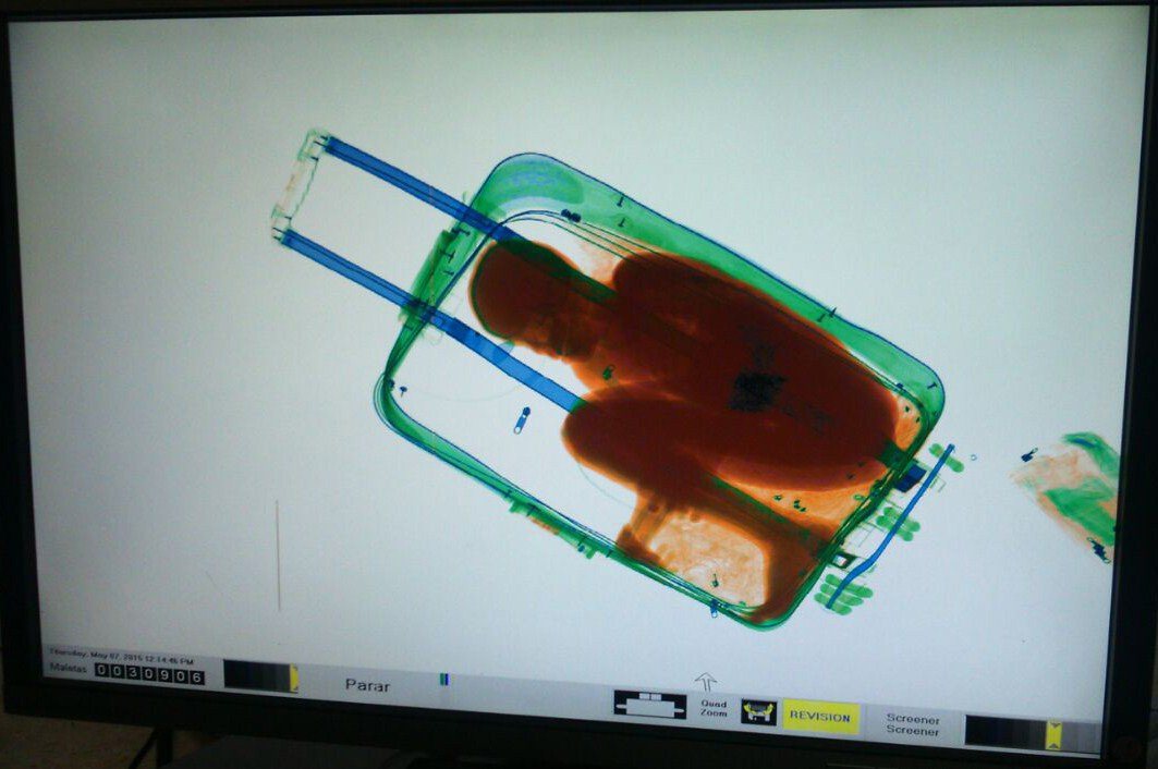 Woman Tries to Smuggle Young Boy in Suitcase