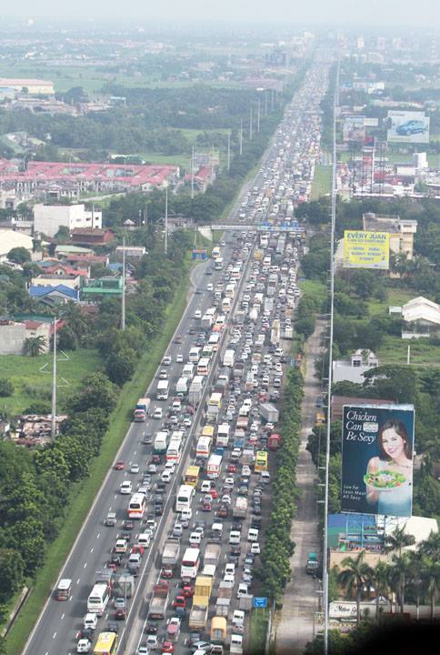 Motorists Leave Their Cars Parked Along NLEX During Celebration