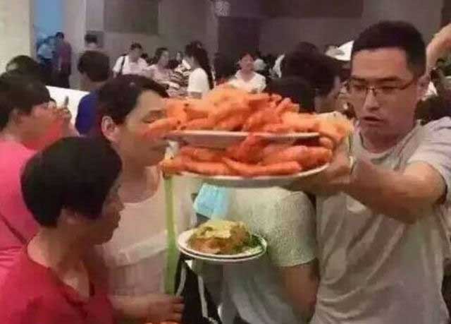Chinese Tourists in a Prawn Buffet in Thailand (1)