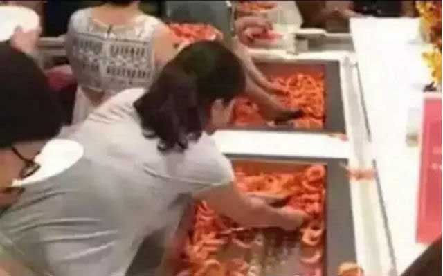 Chinese Tourists in a Prawn Buffet in Thailand (2)
