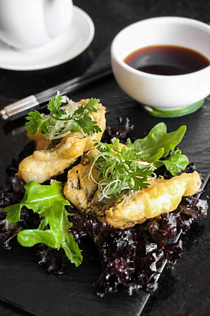 Pan fried cod fish in light soy sauce