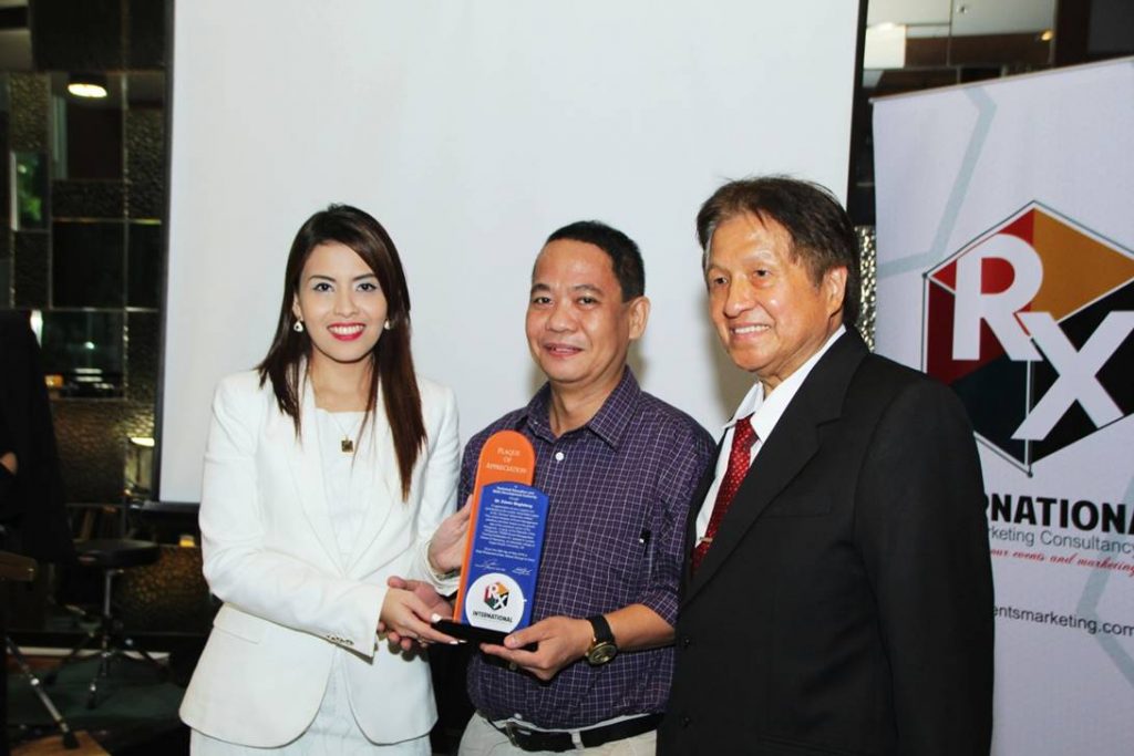 Ms. Xiameer Valdeavilla and Dr. Robert Sy hands out plaque of Gratitude to Mr. Edwin Maglalang of TESDA for being a partner in the dissertation case study for Event Management