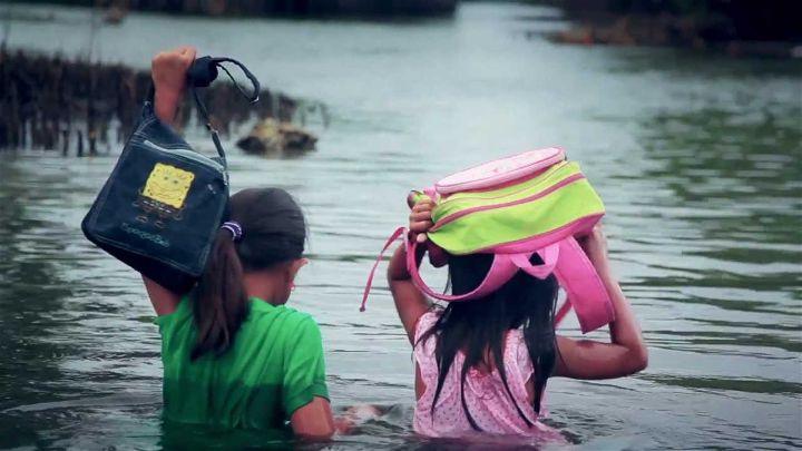 Yellow Boat of Hope Foundation Donates Boats in Remote Villages to Help Kids Get to School