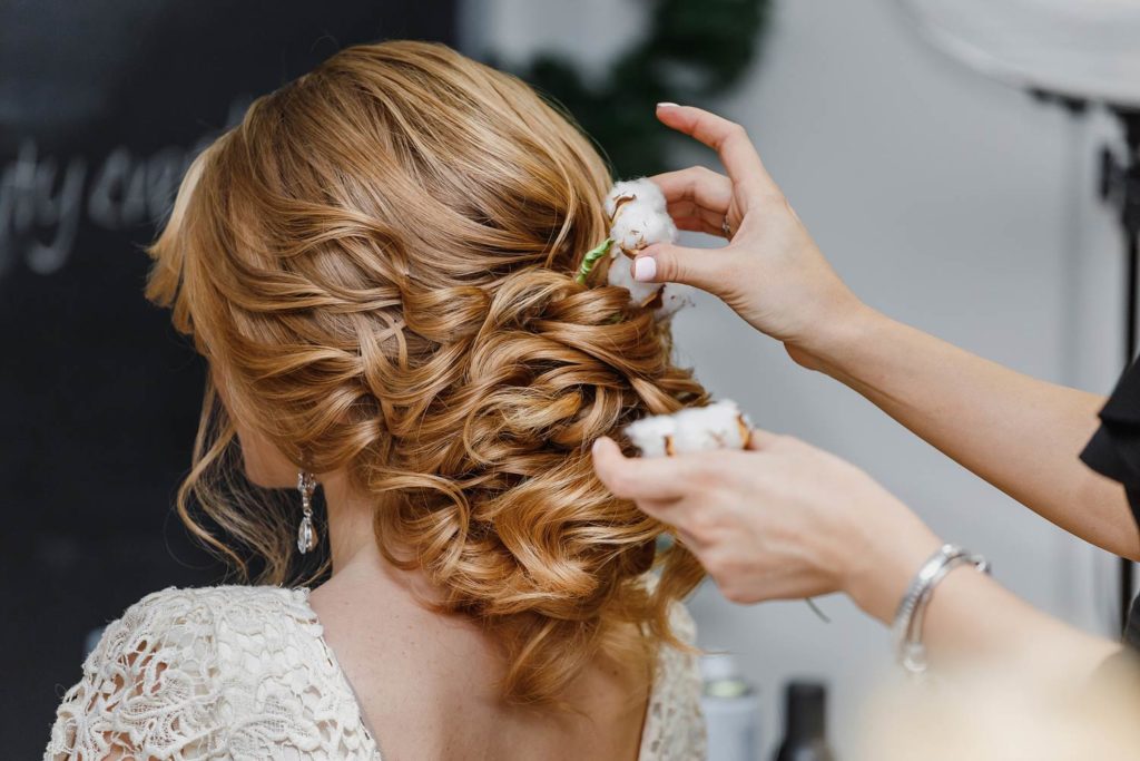 bridal hairstyles loose chignon with decor