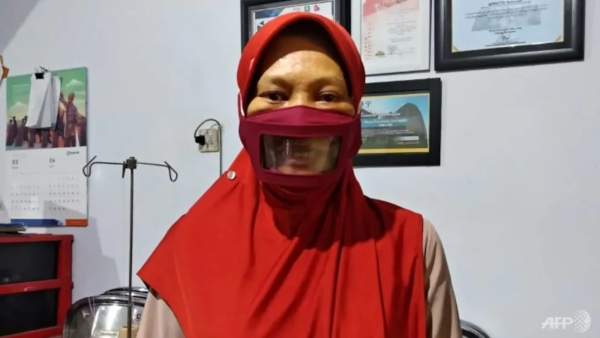 see through face mask deaf indonesia AFP andi 2