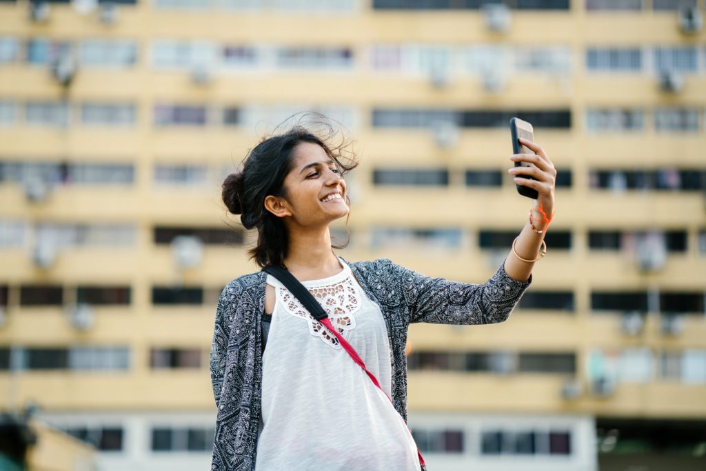 girl taking selfie pexels