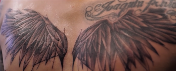 neil arce tattoo angel wings