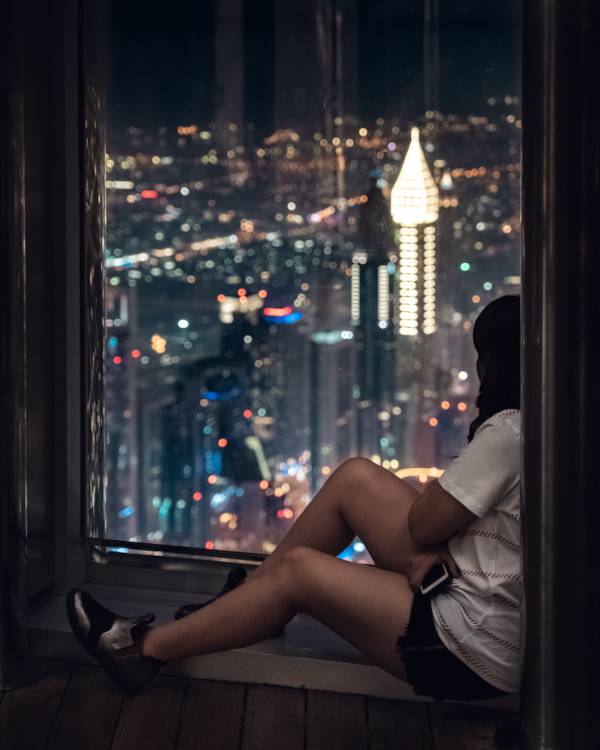girl lonely window city night nightlife lights hotel travel