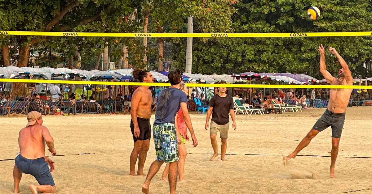 Make friends and play beach volleyball.