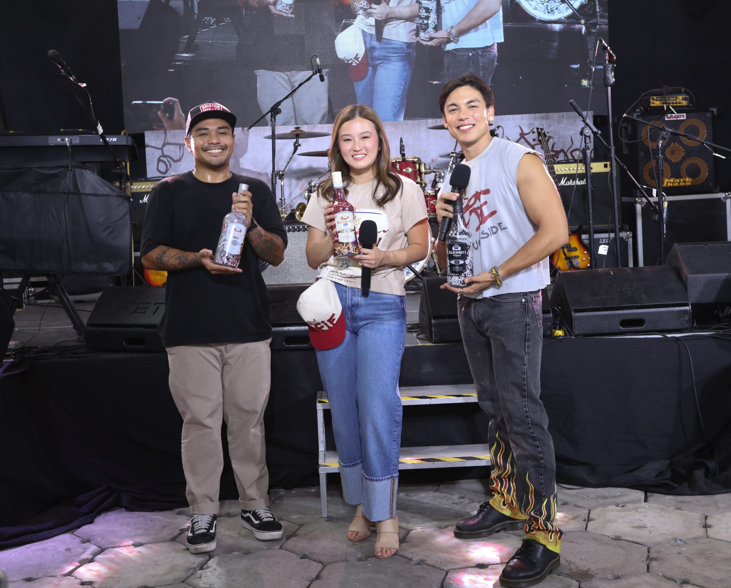 Sales and Marketing Director of Montosco Inc. Ms. Lauren Tanganco together with Alfie Alley host Alex Diaz and street artist Mr. Dennis Bato scaled