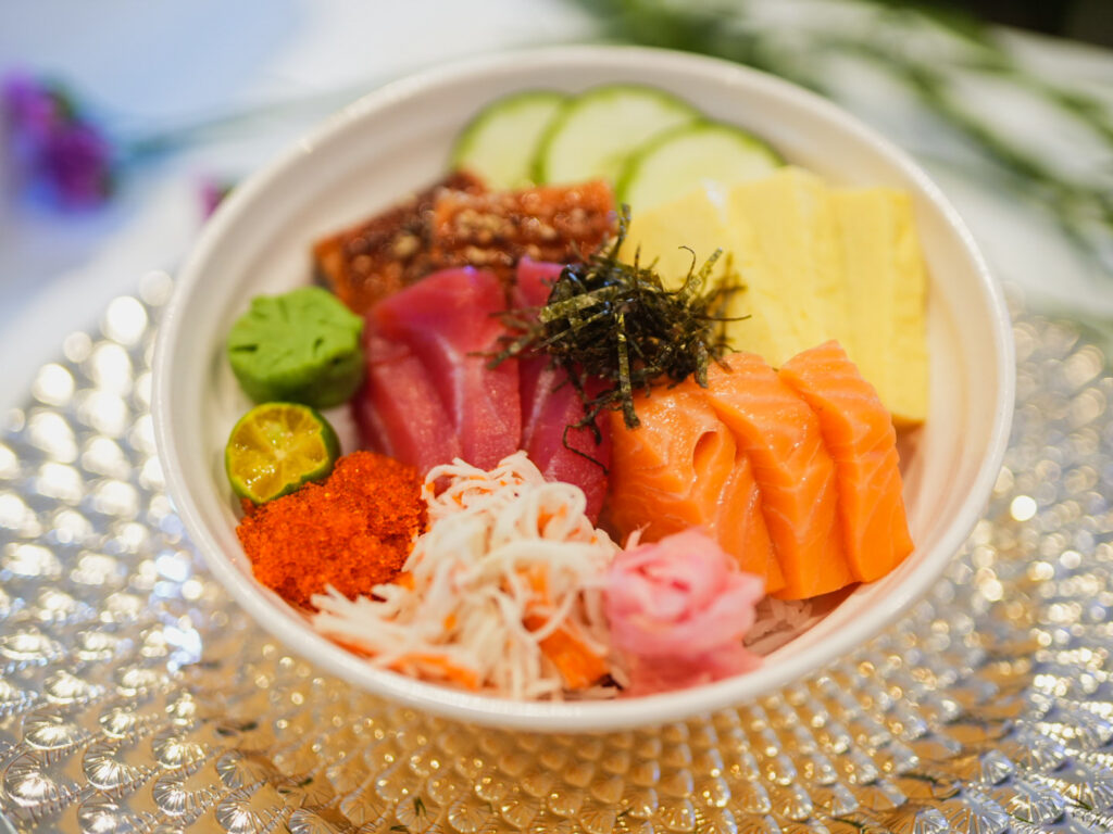 24 Experience the joy of chirashi with Sushi Nori salmon tuna tamago kani and ebiko with cucumber and nori strips