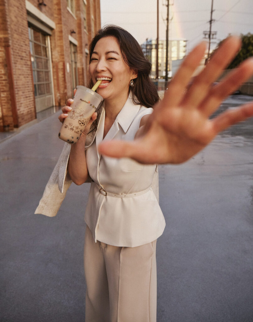 Arden Cho in Ling Belted Tailored Vest Ivory Iman Tweed Jacket Oat and Yuna Tailored High Rise Pants Oat 2 scaled e1710213818625