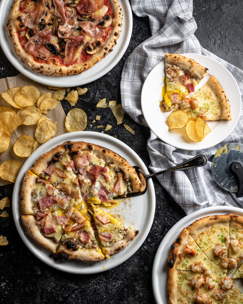 Discover Quezon City’s Authentic Italian Hideaway for Wine and Dine at Pizzeria Bosso 2 2. Pizza Group Photo 1