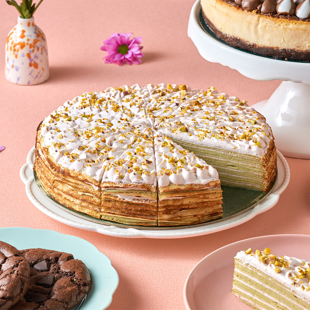 Starbucks' 2025 Spring Menu Introduces New Seasonal Drinks and Treats 5 STRAWBERRY PISTACHIO CREPE CAKE