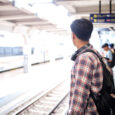 asian traveler man standing on railway platform wa 2025 09 08 08 20 32 utc