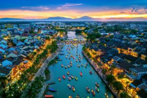 You Can Get 30% Off on Deluxe Fares With This Airline for One Day Only 1 Aerial view of Hoi An ancient town at twilight, Vietnam.