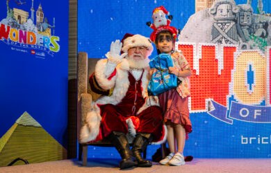 Beneficiaries of the Gift of Life Program creating their own LEGO mosaic and having a close encounter with Santa Claus