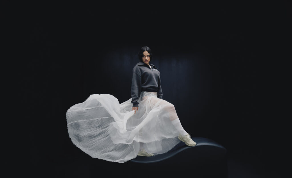 LOOK: ROSALÍA Makes the Ultimate Cool-Girl Sneaker 1 NB S126 204L U204L2SZ Rosalia Full Body Black Background 02 199 FNL